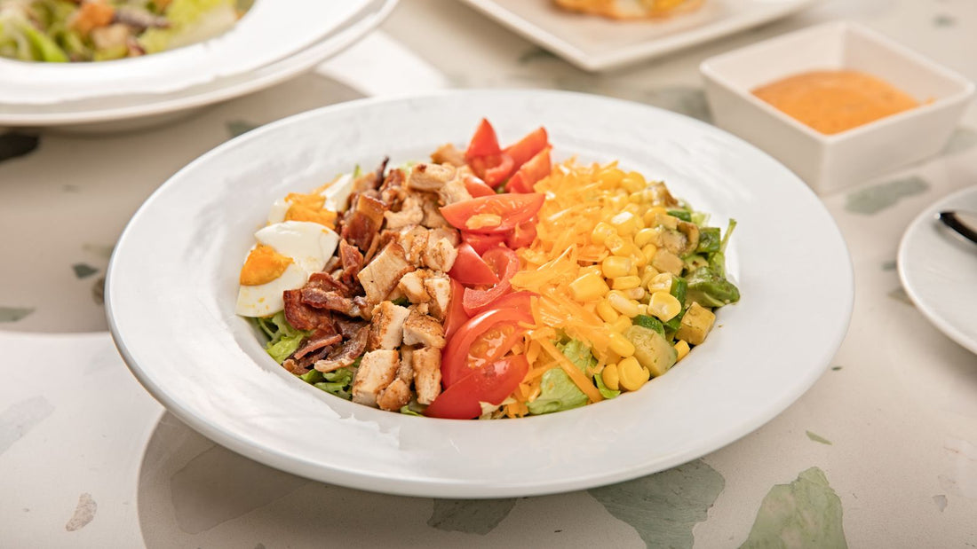 Quail cobb salad with egg, avocado, and blue cheese