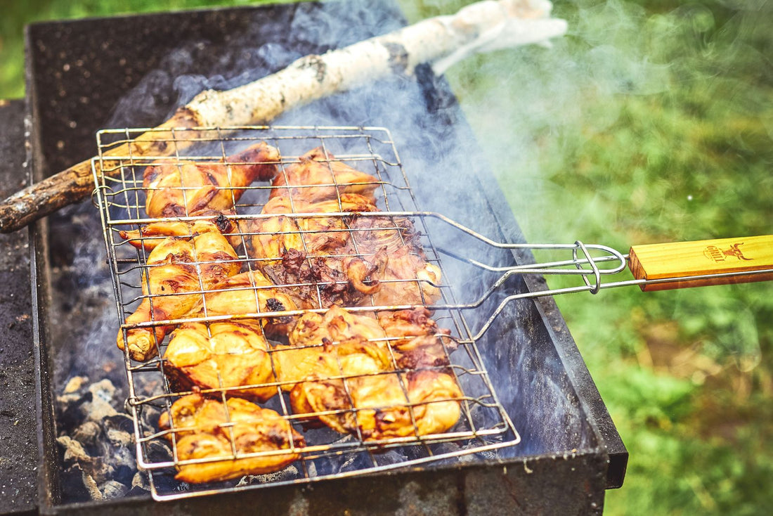 Smoked quail legs on a barbecue grill
